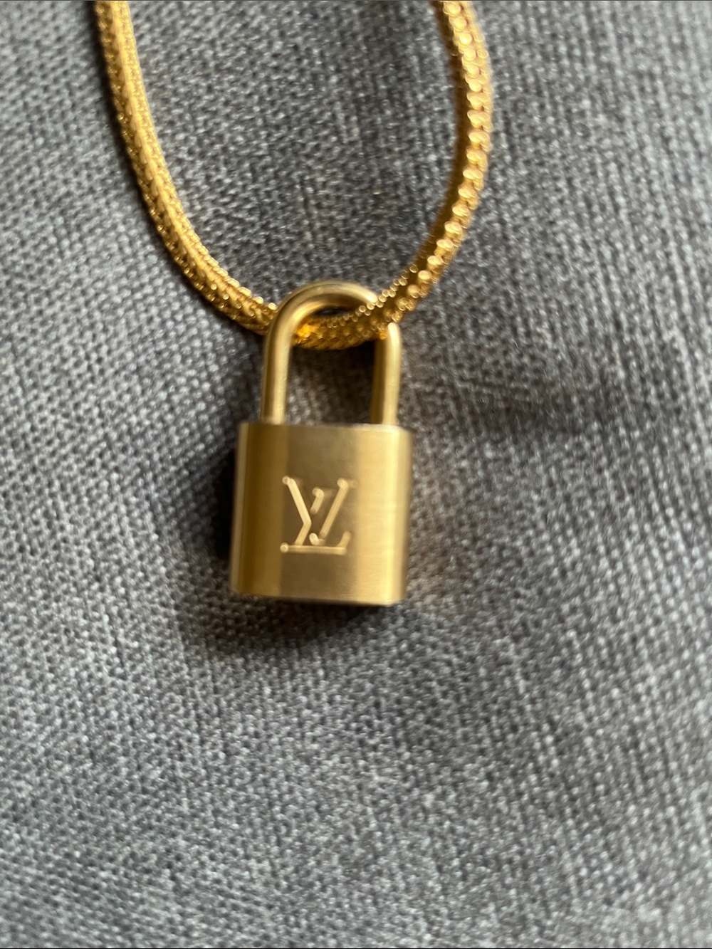 Louis Vuitton Gold Lock